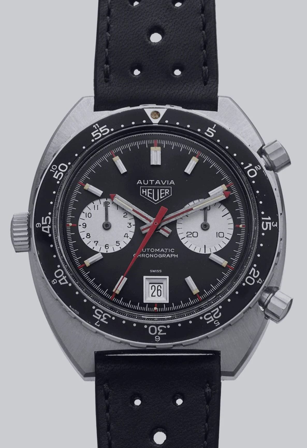 Black dial with contrasting silver subdials, a red centre hand and a black leather strap